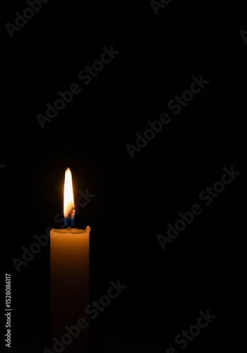 Single burning candle captured mid-flicker in a void  intimate and meditative.
