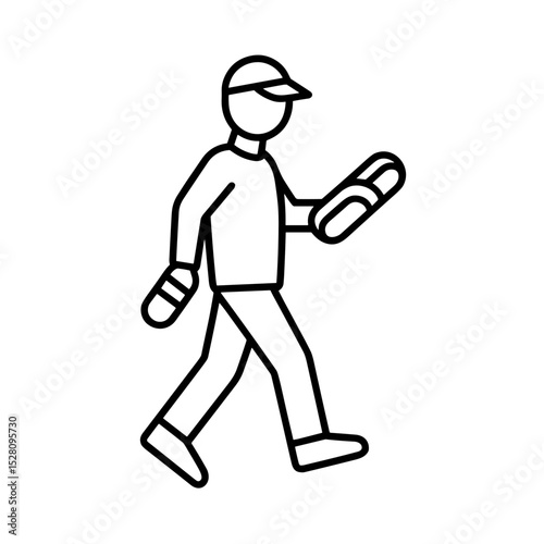 Person walking while holding two hot dogs outdoors in urban setting  