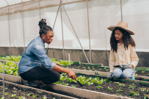 black female farmer  farm garden greenhouse vegetable