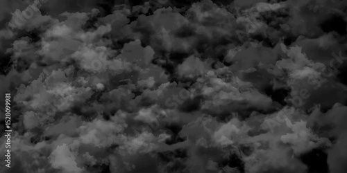 White clouds on a dark sky, monochrome. Smoke and powder overlay on black background