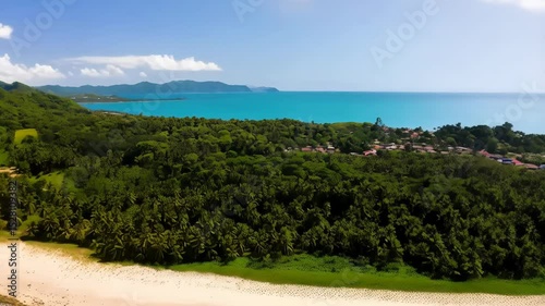 Wallpaper Mural Aerial view of tropical coastline with green hills, lush forest, sandy beaches and turquoise water under a bright sunny sky, showcasing natural beauty. Torontodigital.ca