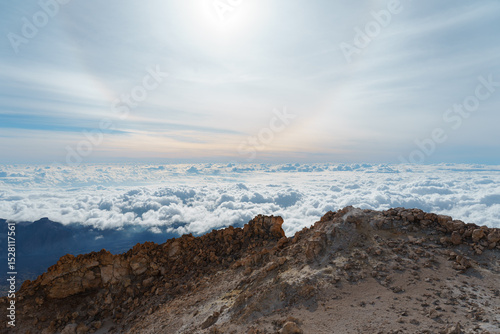 Sun halo above the clouds sea in Teide's summit