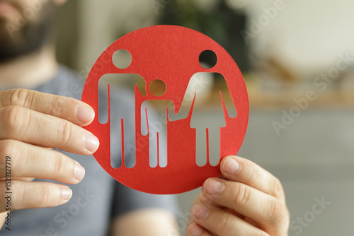 Red circle with cutout fami...