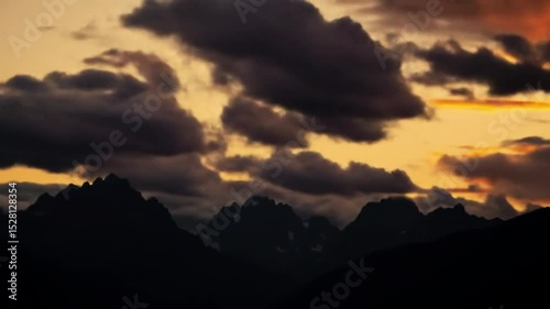 Majestic Mountain Silhouette at Sunset Dramatic Golden Cloudscape Breathtaking Nature Photography Scenic Landscape View