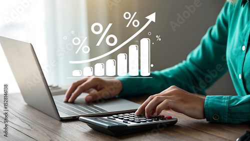 Financial analyst calculating interest rates with laptop and calculator showing growth and percentage increase