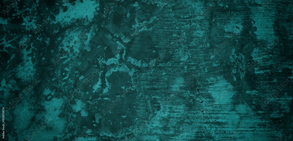 Obraz premium A textured background featuring a deep teal color with a distressed, grunge appearance. The surface shows variations in tone and subtle patterns, creating an abstract and moody aesthetic.