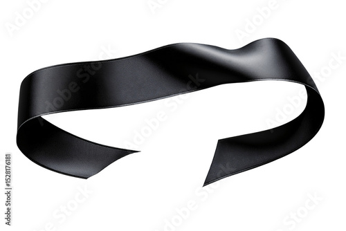 An Elegant Black Ribbon with a Curvaceous Form, Isolated on neutral ground. The ribbon flows in an elegant manner. Its glossy surface catches the light