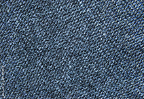 Blue denim cotton twill fabric pattern close up as background