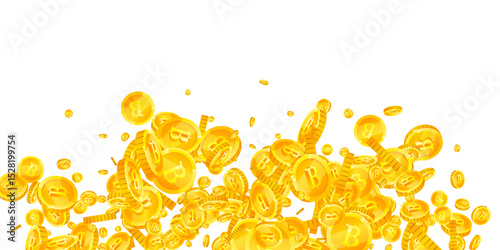 Thai baht coins falling. Gold scattered THB