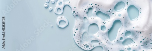 close-up, lush white detergent foam, washing foam, top view, horizontal banner for a cleaning company or laundry, poster, abstract blue background, copy space, free space for text