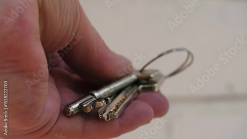 Hand holding keys to new home