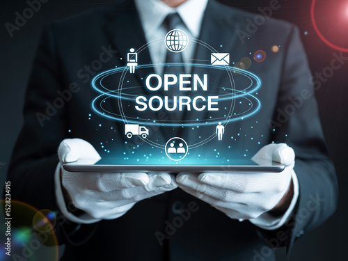 Businessman Holding Tablet Showing Open Source Concept