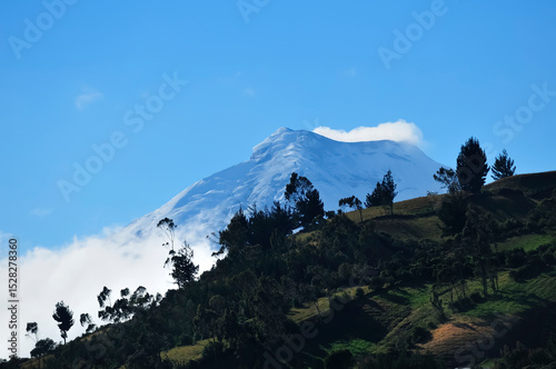Majestic Cotopaxi Volcano Peeking Out from Behind a Hill in El Chaupi
