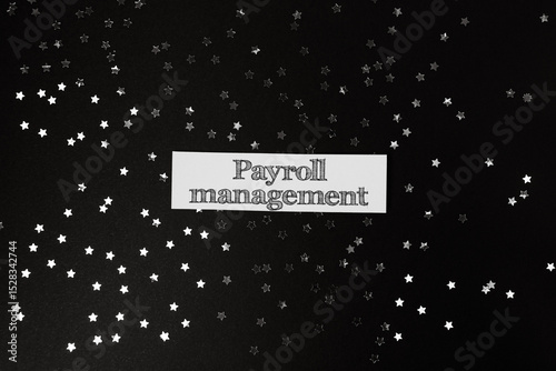 Black background with a white label that says Payroll Management