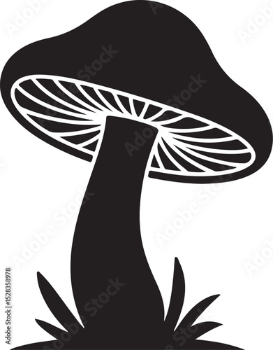 Silhouette of a Single Mushroom in Grass
