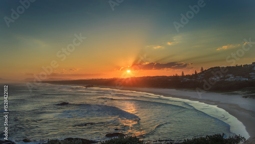 Golden Sunset Over Tacking Point Bay in Port Macquarie, Australia