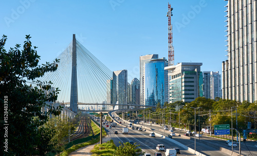 Cityscape with cable-stayed bridge, and city traffic in São Paulo.