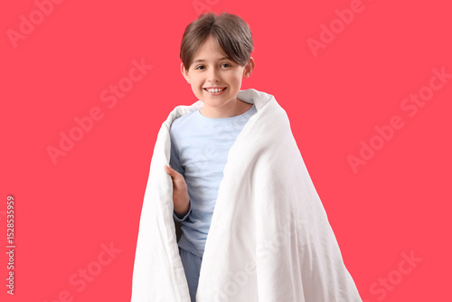 Little boy with blanket on ...