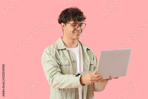 Male programmer with laptop...