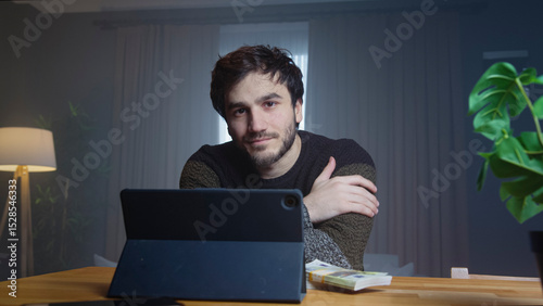 Man speaking to the camera in a professional home office. Investment, cryptocurrency, and wealth management