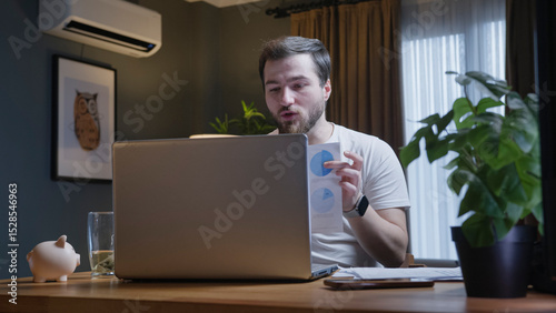 Man presenting data in online video meeting