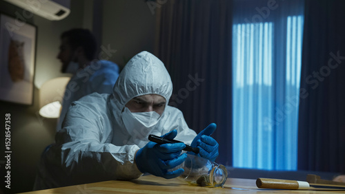 Forensic expert analyzing evidence at crime scene