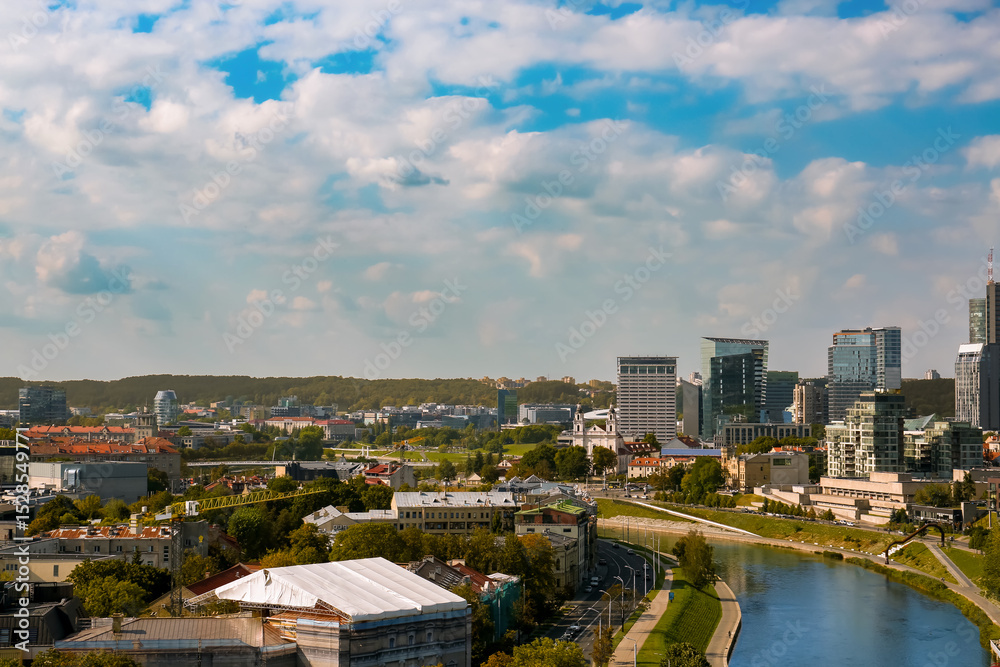 Fototapeta premium Aerial view of city houses over sky background