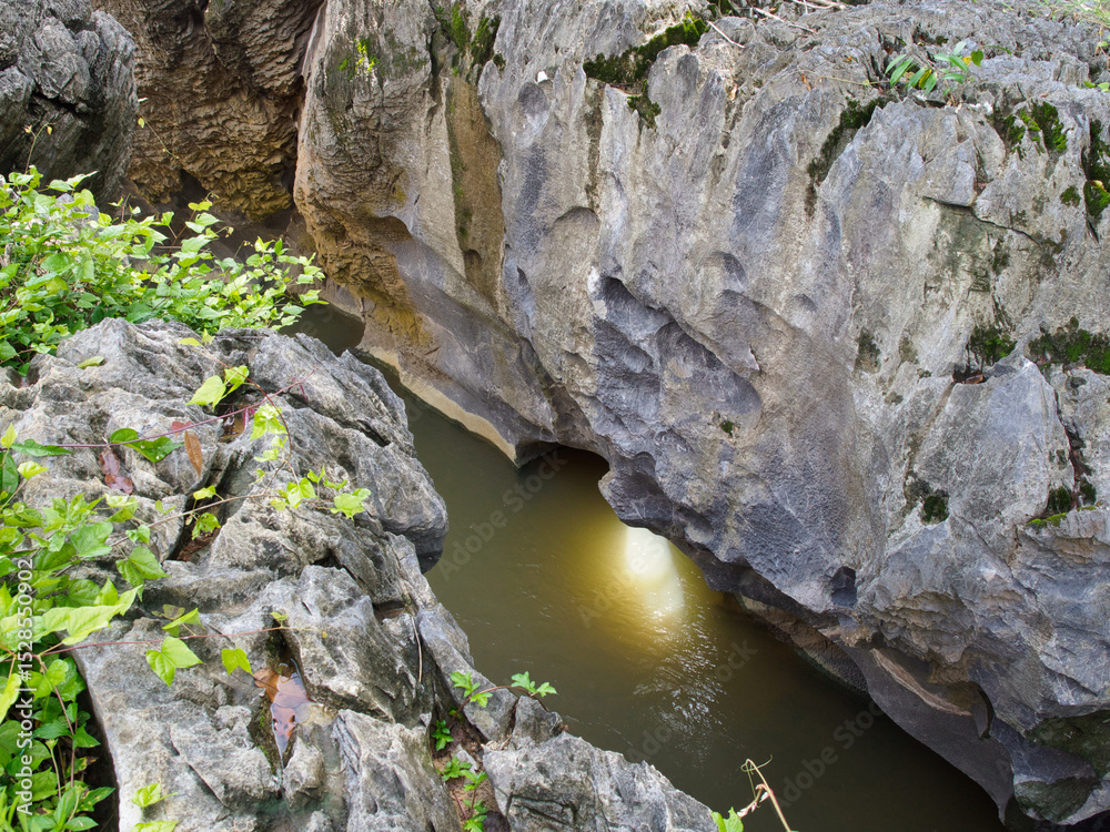 Fototapeta premium Klong Hin Dam River, natural black stone tunnel