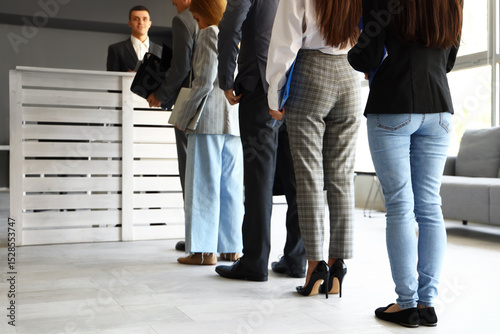 Business people waiting in ...