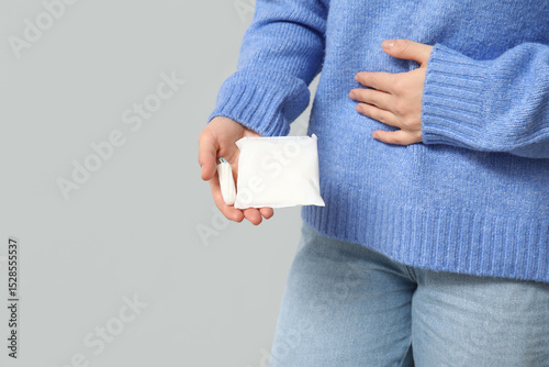 Young woman with menstrual ...