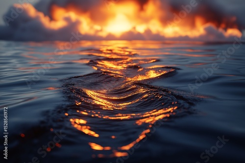 Serene Ocean Sunset. Captivating Water Reflection Against Vibrant Sky and Dramatic Clouds