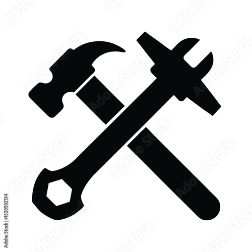 Hammer and wrench crossed vector silhouette