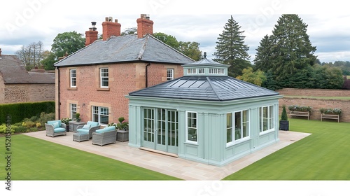 Elegant traditional English home with conservatory, garden furniture and landscape