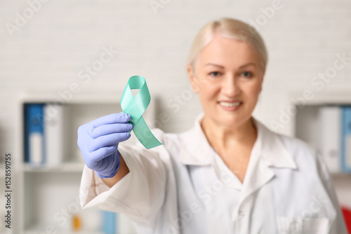 Mature female doctor with t...