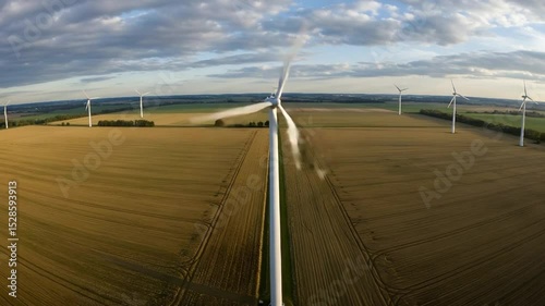 Wind Turbines Spinning in Rural Landscape Aerial View