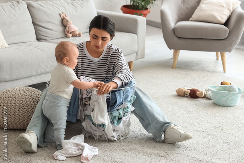 Young mother suffering from...