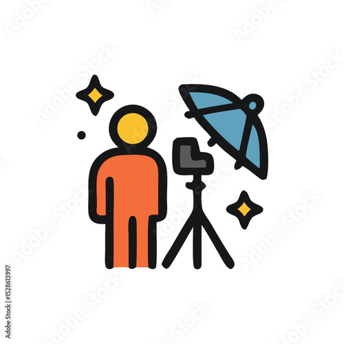 Person posing for a photo shoot under a studio umbrella light.