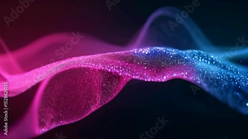 Pink and blue particles flowing on black background