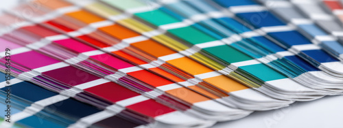 Vibrant color swatches arranged neatly on table, showcasing variety