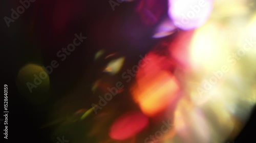 Neon light rays through a crystal prism, light leakage, rainbow transitions, bokeh