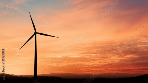 Wind turbine silhouette against vibrant sunset sky, symbolizing renewable energy and hope