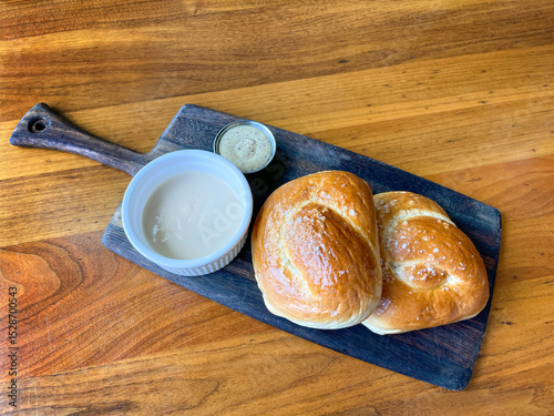 Bavarian pretzels (Bretzels). Pretzel rolls or buns with dipping sauce.