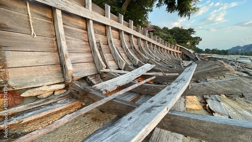 The remains of an old wooden ship washed ashore.