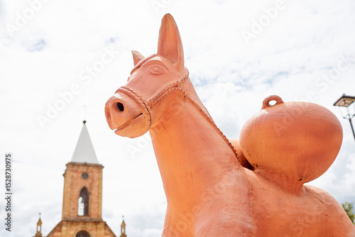 Sculpture of a donkey made of ceramic in the main square of Raquira, Colombia.