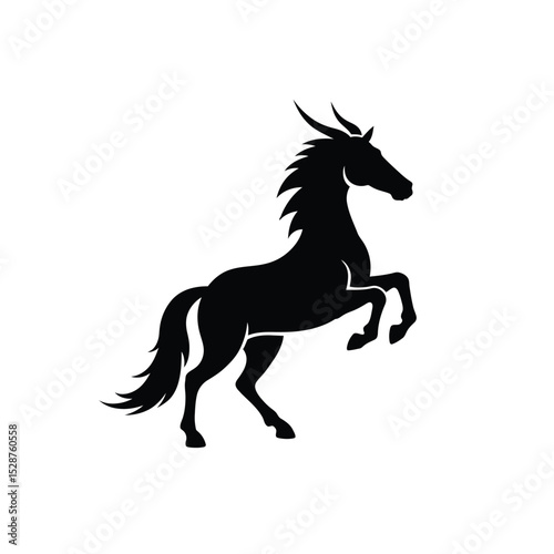 Majestic black stallion rearing up silhouette