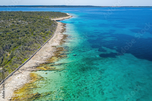 Blue waters in the shallows of Molat Island in Croatia