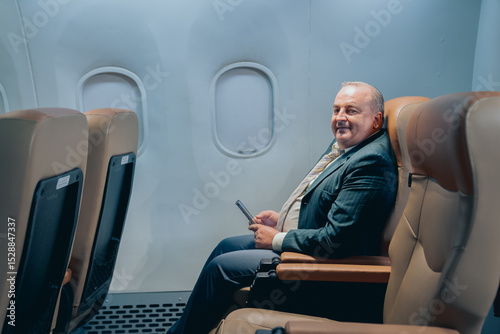 Wallpaper Mural men business sitting seat airplane   Torontodigital.ca