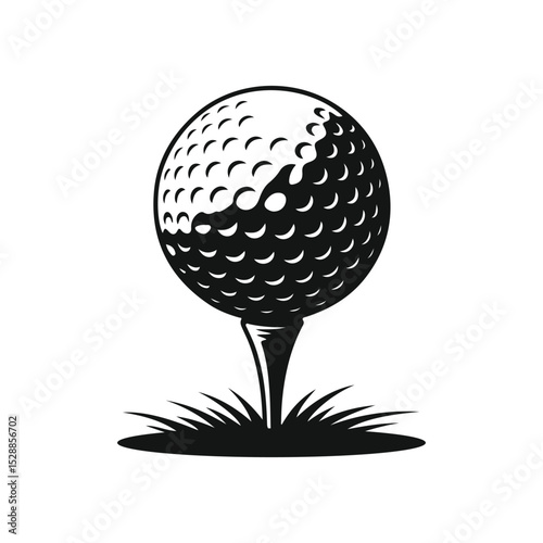 Black and white golf ball on tee and grass against a plain white background