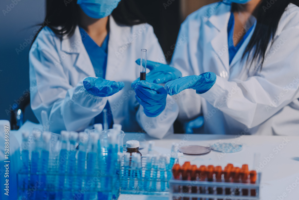 Fototapeta premium Research, experiment and medical trial being done by a scientist in a lab, science facility or hospital. One young, serious and professional researcher organizing, sorting or making a discovery