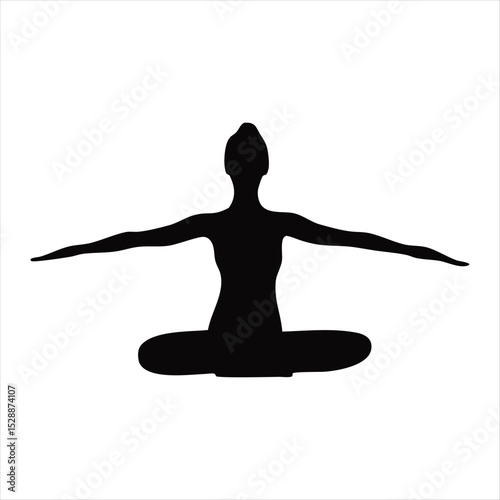 silhouette of a woman doing yoga